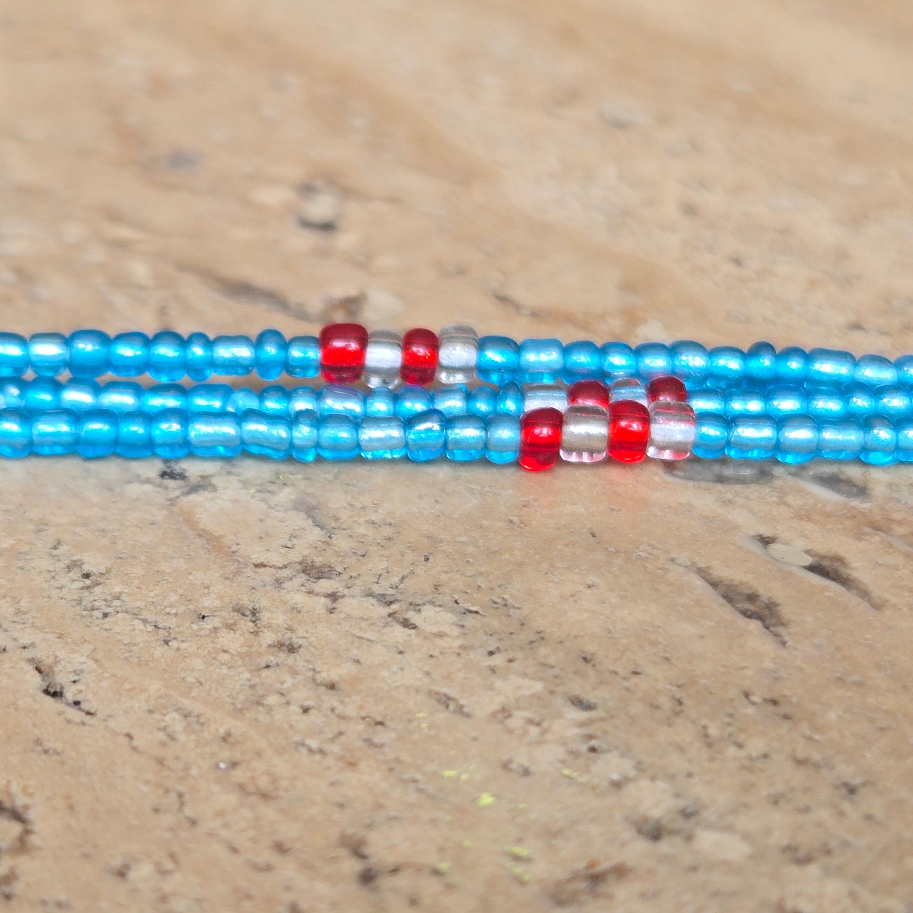 De Overlevingserfenis waist beads